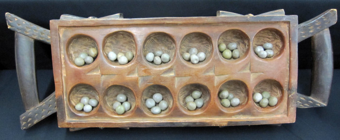 Ivorian Strategy Board Game: "Oware"